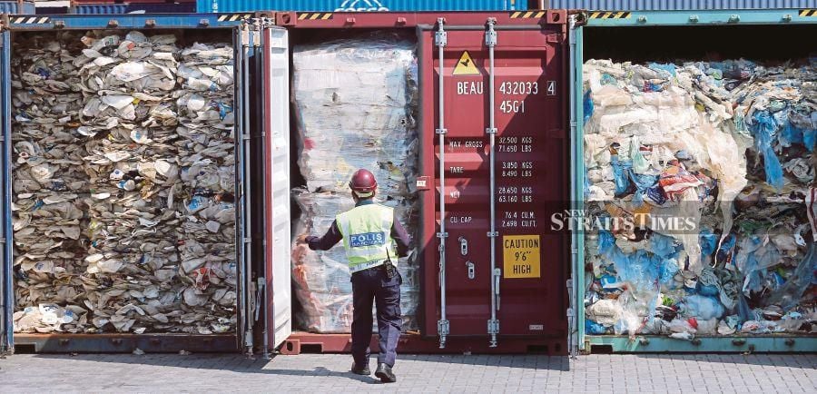 Shipping containers filled with plastic waste brought in from other countries, at Westport in Klang last year. An expert says many stakeholders fail to look at the relationship between humans and nature in dealing with environmental issues and sustainable development as most policies are sectoral. - NSTP/File pic