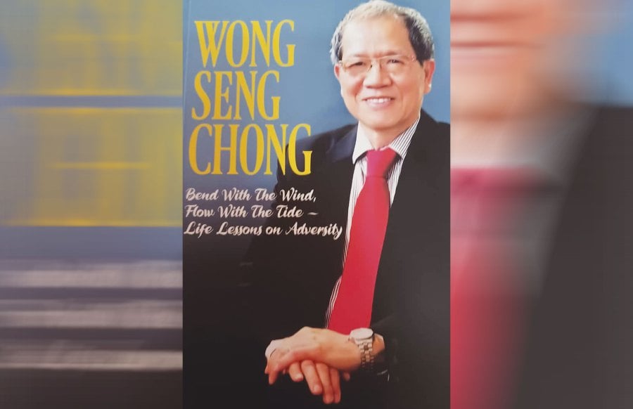 Wong Seng Chong’s book chronicles his struggle to overcome a tough childhood to achieving success as an accountant and lawyer. -Pic courtesy of Reader