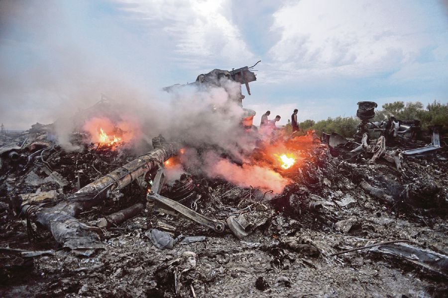 Malaysia Airlines Flight MH17 was shot down over the eastern Ukraine region near Donetsk, Ukraine, on July 17, 2014. Why was Malaysia, the operator of the flight, initially not included in the Joint Investigation Team? EPA PIC 