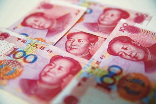  The two per cent one-off devaluation on Tuesday and subsequent one per cent fall in the yuan are not big in themselves, but further depreciation might be. EPA pic 