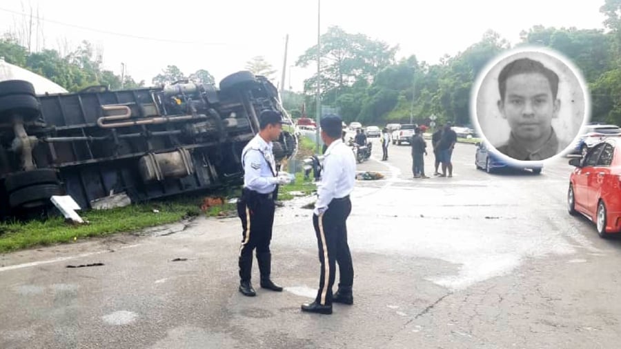The lorry turned turtle after crashing into a motorcyclist at Km25 of Jalan Lipis-Benta, Lipis, Pahang, today (June 16). — PIC FROM LIPIS POLICE