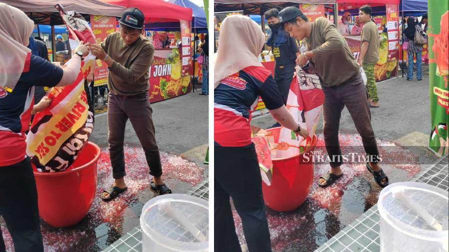 It was a tough day for a Ramadan bazaar trader when his two big containers filled with watermelon juice toppled over from a damaged table in Laman Niaga Komuniti, Bandar Baru Bangi last Wednesday. Pic from Sufri