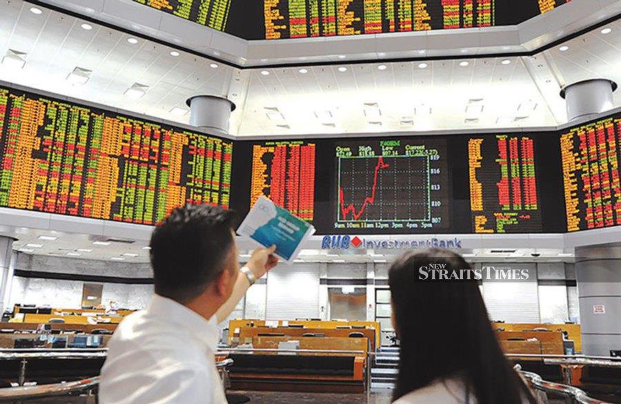 Bursa Malaysia opened lower on Wednesday tracking Wall Street's subdued performance.