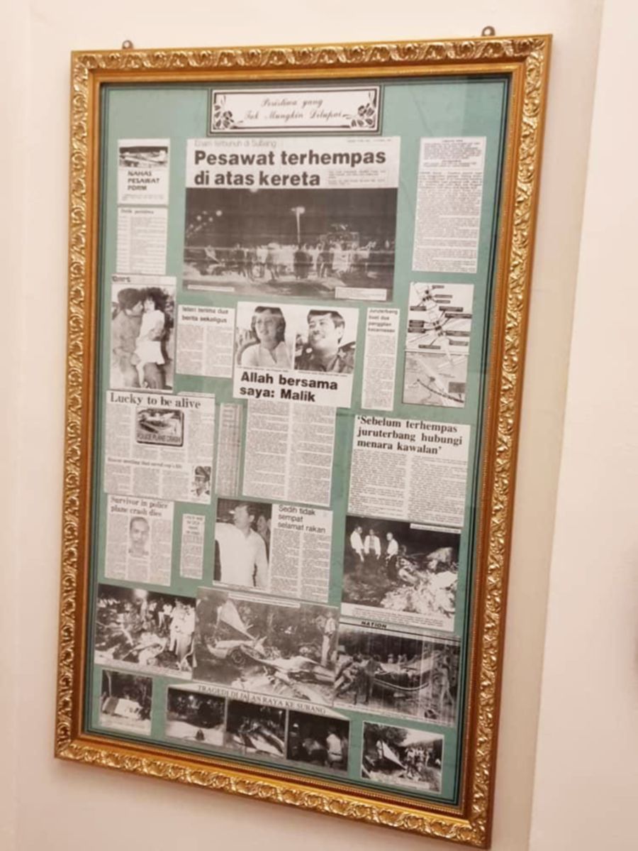A framed collection of paper cuttings of the tragedy on the wall of Datuk Abdul Malek Abdul Hamid’s house. PIC COURTESY OF DATUK ABDUL MALEK ABDUL HAMID