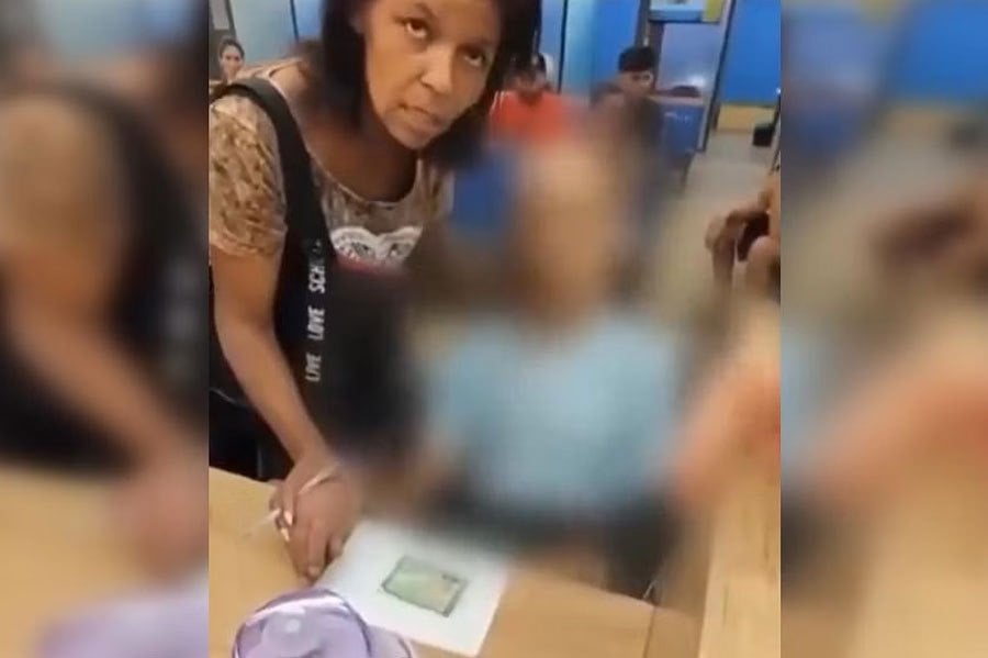 Erika de Souza Vieira Nunes wheeled a cadaver into a Rio bank and told the teller the man wanted a loan for 17,000 reais, security camera video showed. PIC SCREEN CAPTURED FROM SOCMED