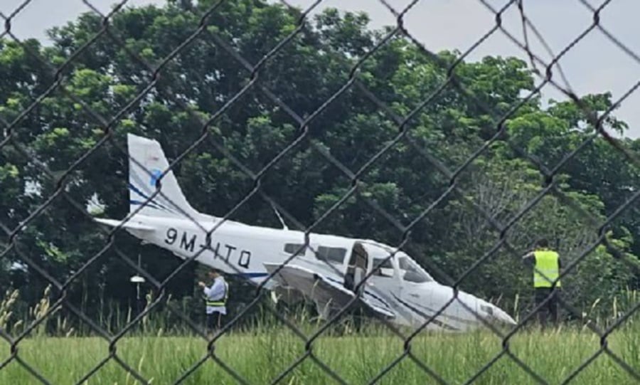 A trainee pilot faced a precarious and scary situation when she lost control of the Piper 28 aircraft (pic) while trying to land at the Melaka International Airport (LTAM). -PIC COURTESY OF MELAKA TENGAH DISTRICT POLICE