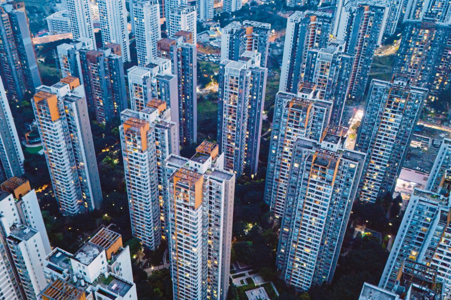 (FILES) Residential buildings are seen in Chongqing in southwest China on March 19, 2024. File Photo by AFP/China OUT