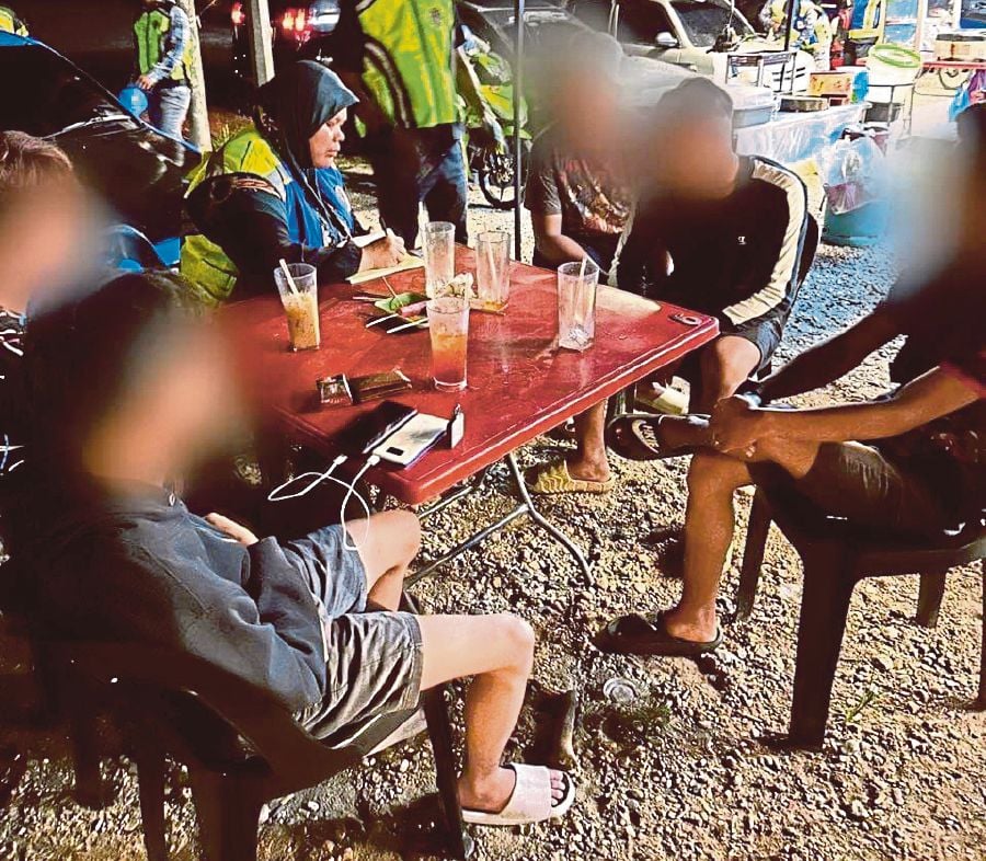 Two of the seven youths who were recently hauled up for wearing thigh-length shorts said they were still in shock over their encounter with the religious authorities here. - Courtesy pic