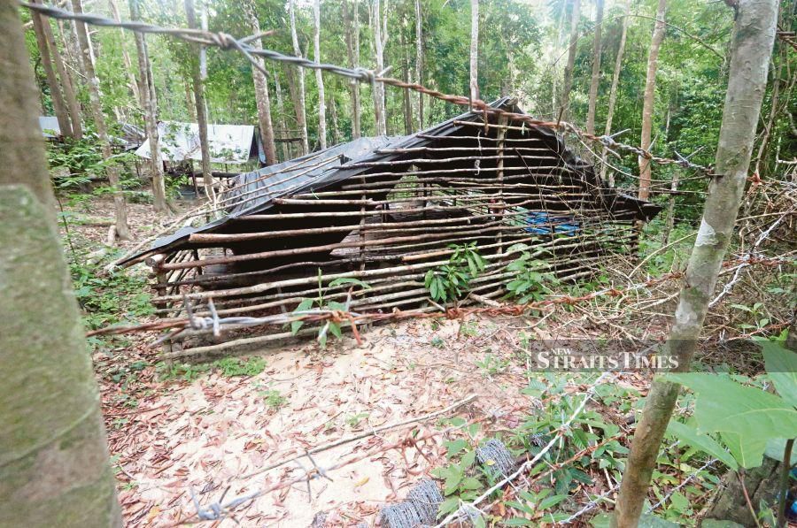 A detention camp found in 2015 in the jungles of Bukit Genting Perah in Wang Kelian, a few hundred metres from the Malaysia-Thai border. FILE PIC 