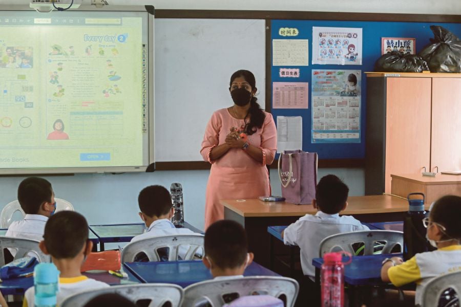 Parents find that at vernacular schools, teachers keep them highly involved in their children’s development by regularly updating them on their progress. FILE PIC 