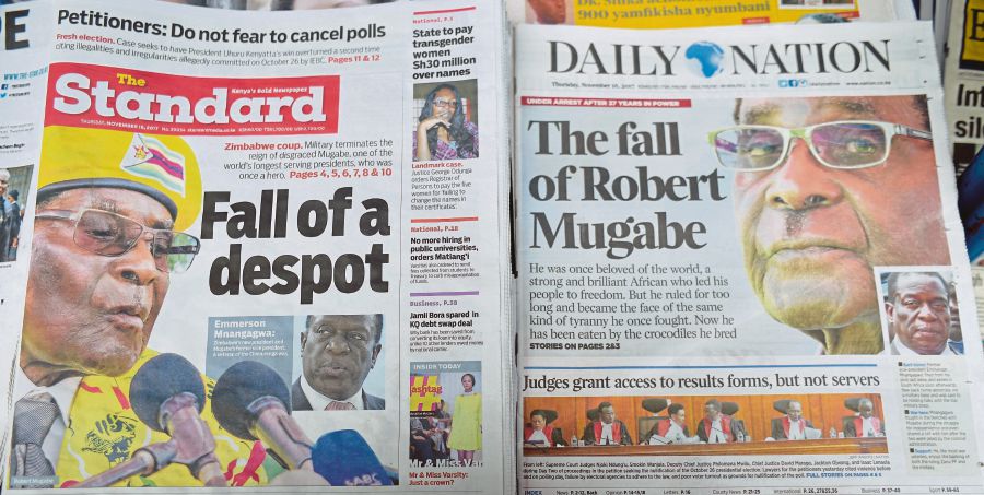 Local dailies with headlines about the situation in Zimbabwe. The people are weighing an uncertain future without President Robert Mugabe after the army took power and placed the 93-year-old under house arrest. AFP PIC 