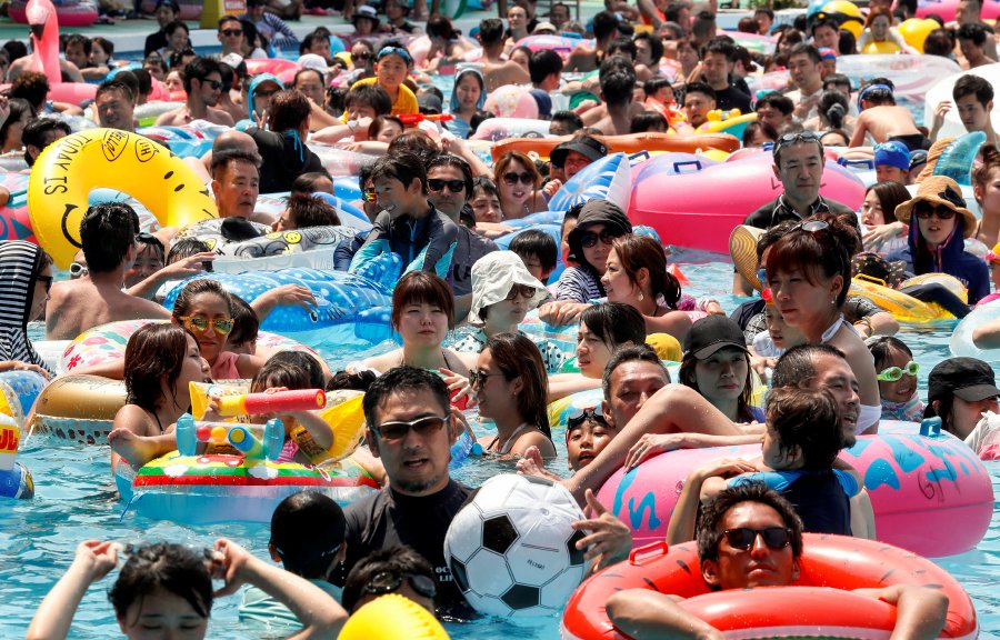 Heatwave blankets Japan, kills 14 people over long weekend ...