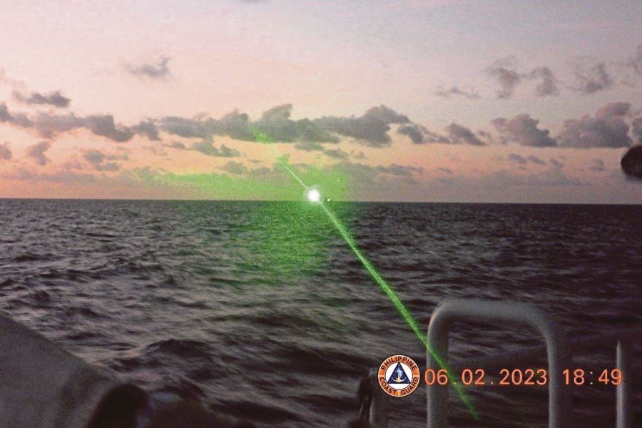 (FILE) This photo provided by the Philippine Coast Guard shows a green military-grade laser light from a Chinese coast guard ship in the disputed South China Sea. (Philippine Coast Guard via AP, File)