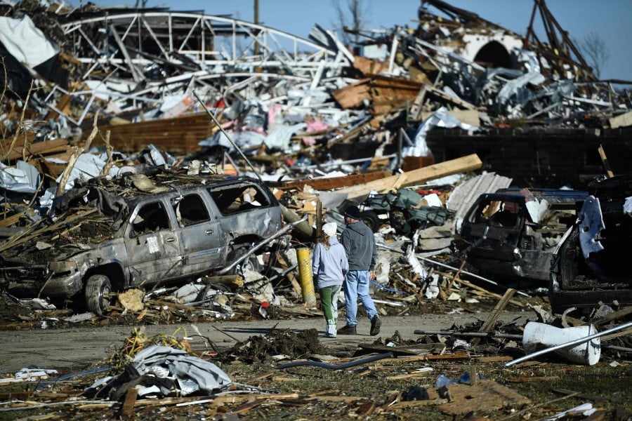 Tornado damage is seen after extreme weather hit the region December 12, 2021, in Mayfield, Kentucky. - - AFP pic