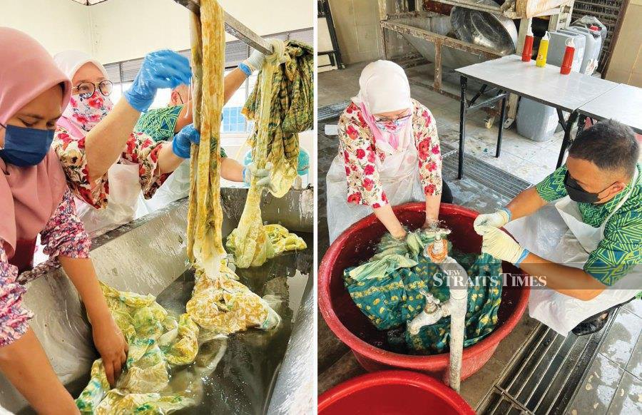 One of the processes in batik-making is washing the piece in sodium silicate to ‘fix’ the colour (left pic) and Tunku Azizah washing the finishing product before it is boiled in water to remove the wax.
