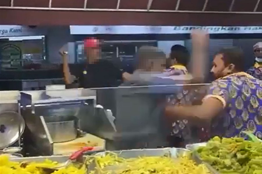 Two men who were involved in a brawl at the popular Pelita Nasi Kandar restaurant in Cyberjaya will be charged at the Sepang Magistrate Court tomorrow. -Pic screen capture from viral video