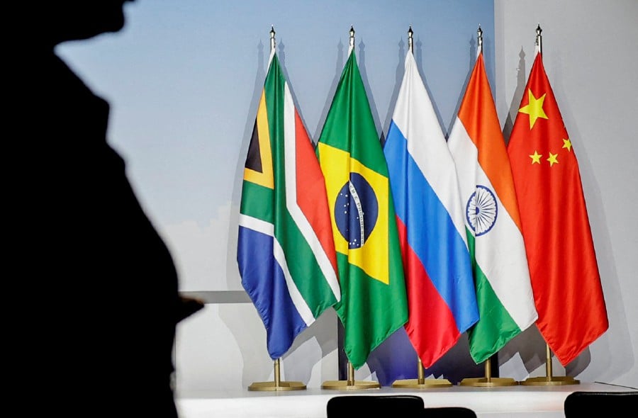 The flags of South Africa, Brazil, Russia, India and China during the 2023 BRICS Summit at the Sandton Convention Centre in Johannesburg on August 24, 2023. The BRICS countries, an acronym of the five members Brazil, Russia, India, China and South Africa, meet for three days for a summit in Johannesburg. AFP FILE PIC