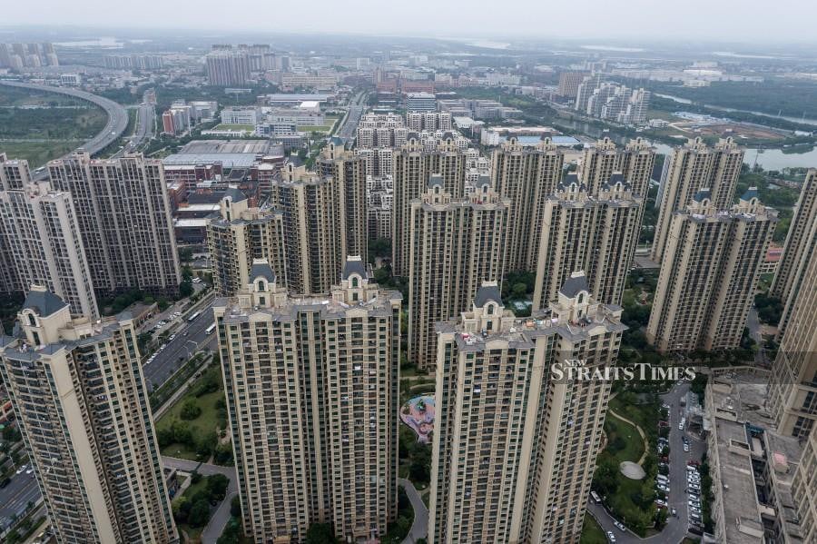 This aerial photo taken on September 28, 2023 shows a housing complex by Chinese property developer. (Photo by AFP) / China OUT