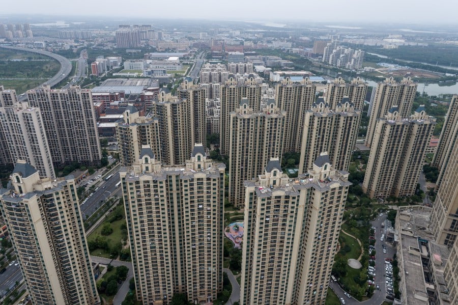 This aerial photo taken shows a housing complex. (Photo by AFP) 