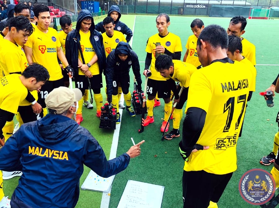 National hockey players in a huddle during their friendly match against France on Monday. - Pic courtesy of MHC