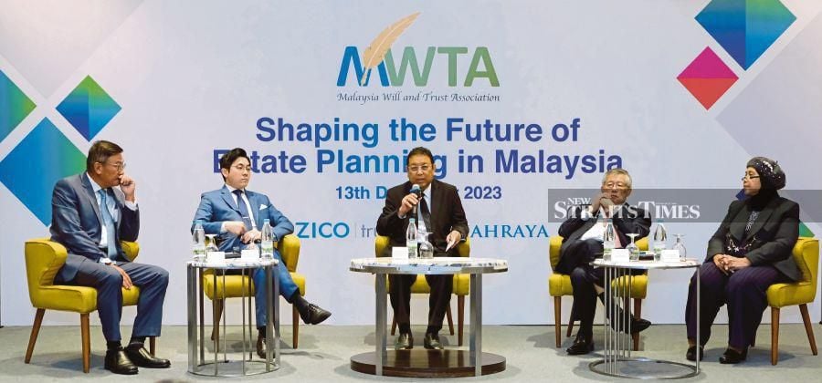 (From left) Malaysia Will & Trust Association president Datuk Chua Meng Min, Amanah Raya Bhd group chief business officer Jack Yap Ngee Heong, ZICO Trust (M) Bhd chairman Tan Sri Dr Nik Norzrul Thani, ZICO Holdings Inc executive director Chew Seng Kok and Think Plus Consulting Sdn Bhd group chief executive officer Dr Norsaidatul Akmar Mazelan at the forum in Petaling Jaya last Wednesday. - Pic courtesy of Malaysia Will & Trust Association
