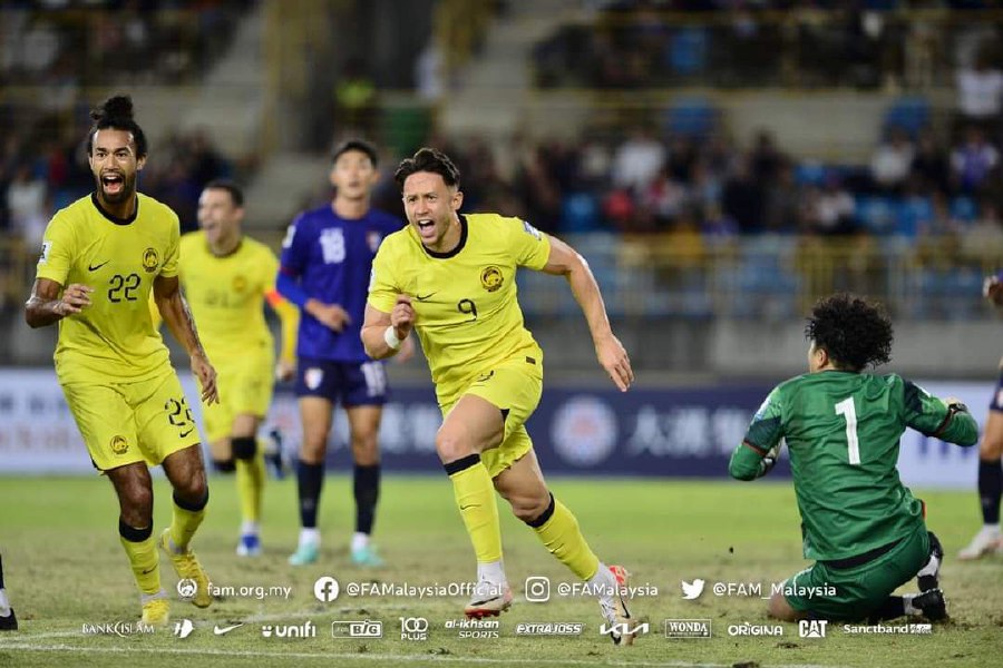 Malaysia’s Darren Lok celebrates scoring against Taiwan in today’s World Cup qualifier in Taipei. PIC COURTESY OF FAM