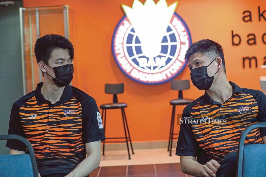 BAM coaching director Wong Choong Hann (right) with Lee Zii Jia. - NSTP file pic