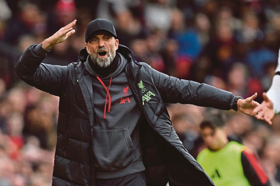 Jurgen Klopp warned his title-chasing Liverpool team that they will have to cope with “derby fever” as he prepares to face Everton for the final time today. AFP FILE PIC