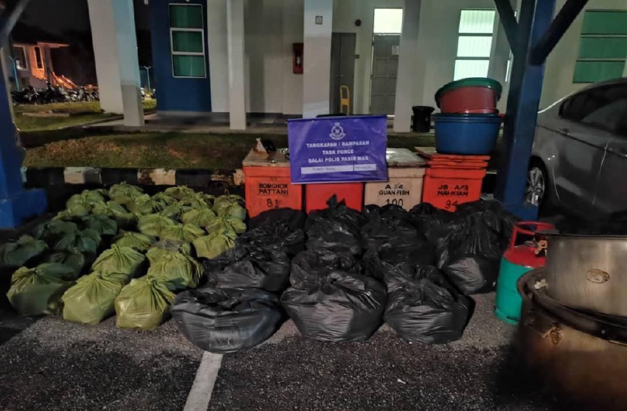 Following the raid, police seized 180kg of ketum leaves and 357 litres of ketum juice from the suspect. -Pic courtesy of PDRM