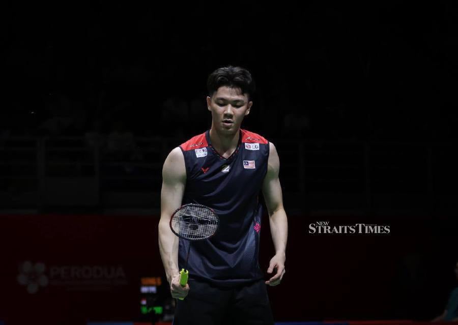 The world No. 10,  Lee Zii Jia did not disappoint the fans at the Axiata Arena, Bukit Jalil, when he clawed back from a game down to defeat China's Zhao Jun Peng 19-21, 21-11, 21-14 in the first round of the Malaysia Masters. NSTP/ASWADI ALIAS