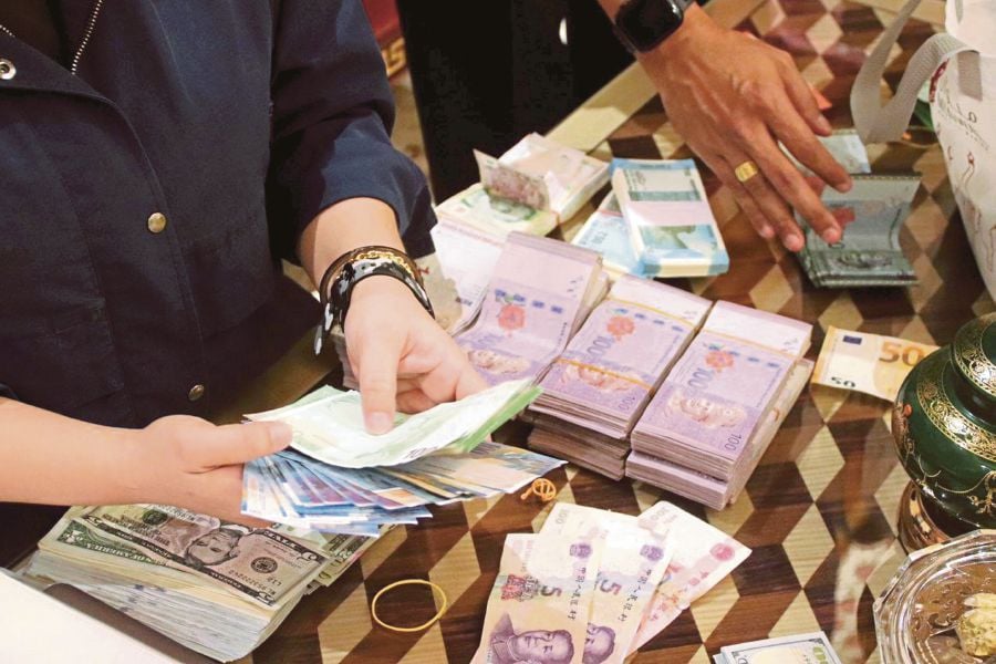 The media reported the seizures of RM38 million in cash, 17 luxury cars and 200kg of gold worth about RM60 million almost two months ago. However, no developments on the case have been reported since. PIC COURTESY OF THE MALAYSIAN ANTI-CORRUPTION COMMISSION