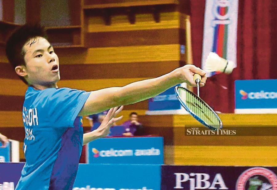 FILE PIC: Beregu lelaki Malaysia, Justin Hoh Justin Hoh will not allow himself to be distracted by the adversities faced by the Malaysian camp in the run-up to the Thomas Cup, and wants his debut to be a memorable one. — NSTP FILE PIC