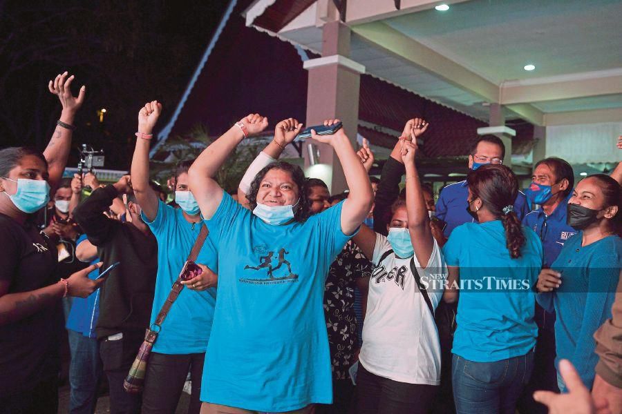 Barisan Nasional supporters cheering after the coalition was declared the winner in the Melaka election on Saturday. - BERNAMA PIC