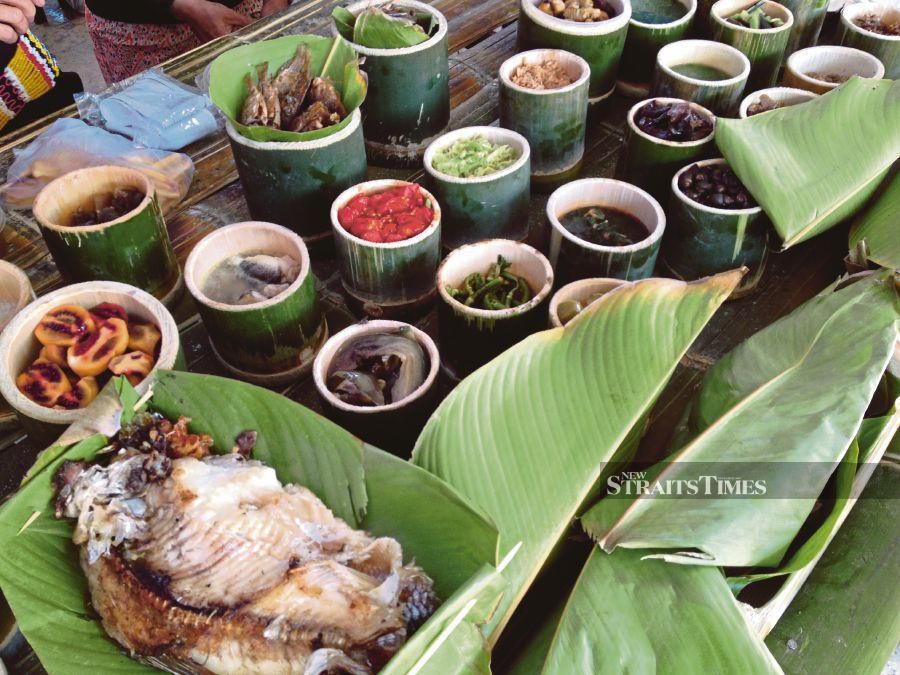 Pais ikan (grilled fish in banana leaf) served with condiments during Pesta Nukanen to mark the food, farming, forest and culture of Bario highlands. 