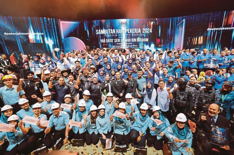Representatives of various agencies and sectors participating in a Labour Day celebration at the Putrajaya International Convention Centre on May 1. -NSTPASYRAF HAMZAH