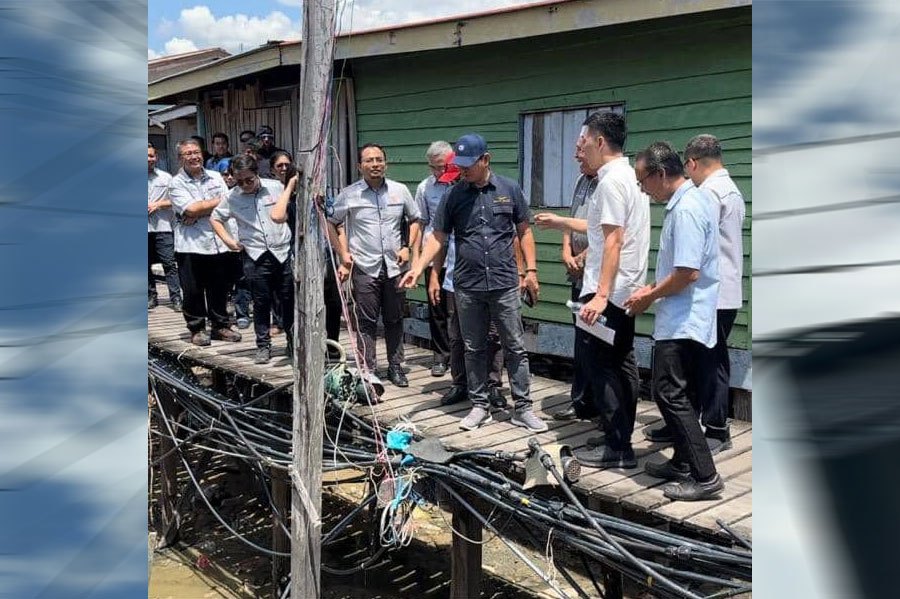 Almost every household at Kampung Hidayat Batu 4 here is tapping illegal electricity connections. PIC COURTESY OF SESB