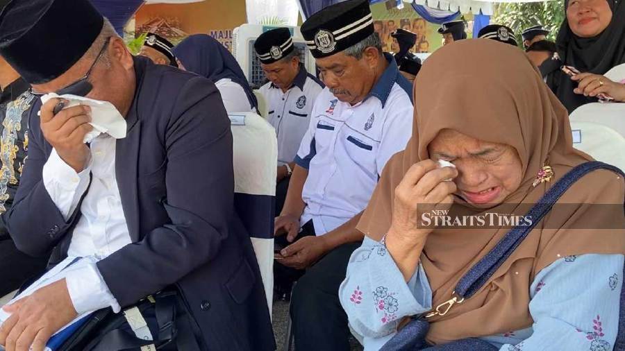 Fatimah Samad (right) who lost her father in the Bukit Kepong attack at just three years old, revealed her enduring hatred towards communists. - NSTP/ALIAS ABD RANI