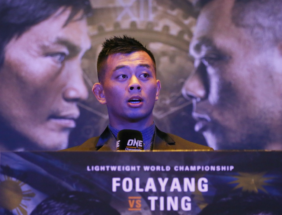 (file pix) Ev Ting answers questions from sports writers during a news conference for his lightweight mixed martial arts (MMA) title fight against Eduard Folayang of the Philippines Tuesday, April 18, 2017 in suburban Pasay city, south of Manila, Philippines. Ev Ting lost to reigning Lightweight World Championship Eduard Folayang. AP Photo