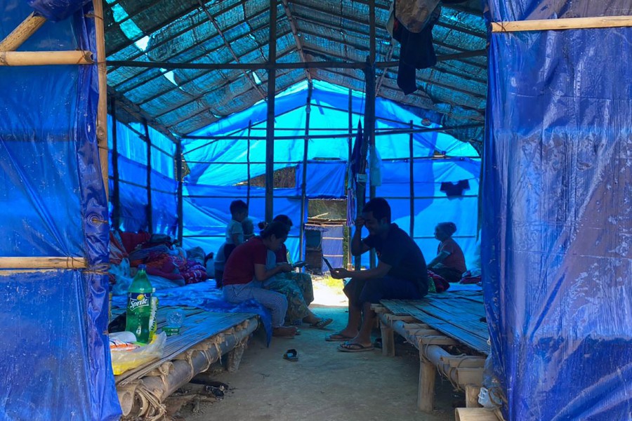 Refugees who fled Myanmar rest in a basic shelter at Farkawn quarantine camp in India's eastern state of Mizoram near the Myanmar border on September 23, 2021, after they fled across the border following attacks by Myanmar's military on villages in western Chin state. -AFP PIC