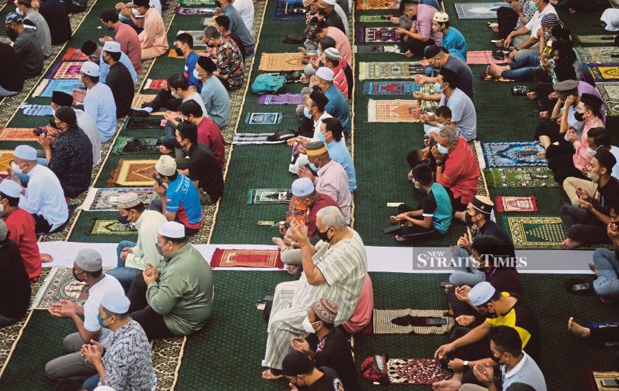 People performing Friday prayers at Masjid Negeri in Kota Kinabalu last week. Ramadan is an opportune time for Muslims to reflect on their religious identity and life purpose. - NTSTP/MOHD ADAM ARININ