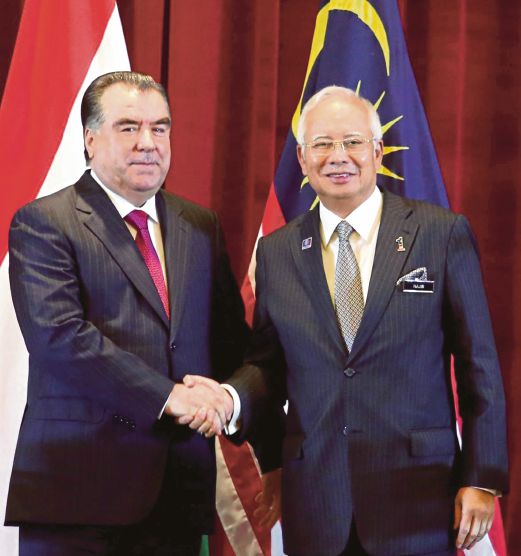 Prime Minister Datuk Seri Najib Razak and Tajikistan President Emomali Sharipovich Rahmon in Putrajaya yesterday. Pic by Mohd Fadli Hamzah 