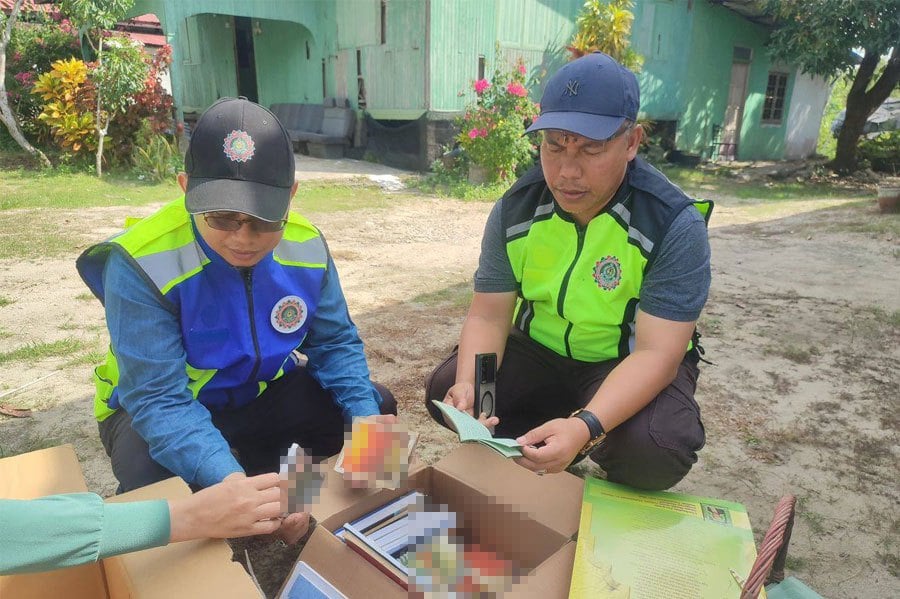 The two-hour-long raid on the premises that housed a charity home and a school started at 9am and involved 50 personnel from the state police, state Islamic Affairs and Religious Department and state Islamic Religious and Malay Customs Council. COURTESY PIC