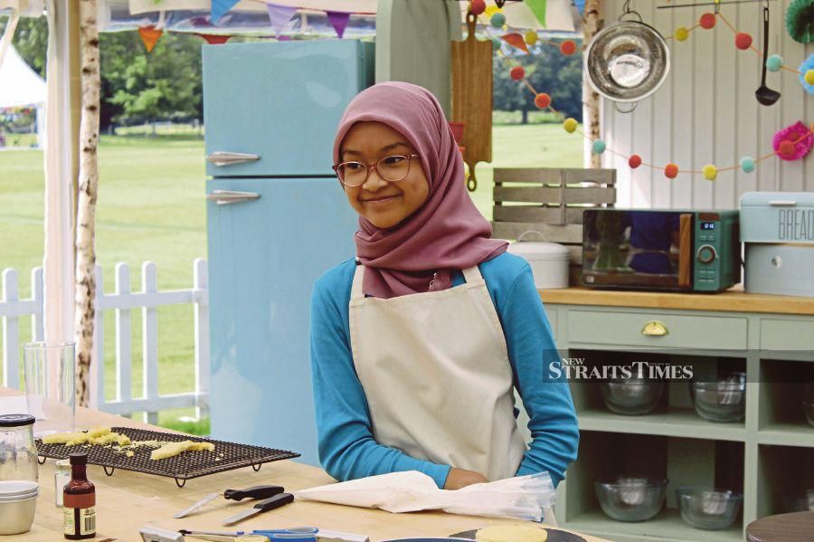 Aisya Syahrul showing her skills in Channel 4’s ‘Junior Bake Off’. - Pic courtesy of Carl Palmer