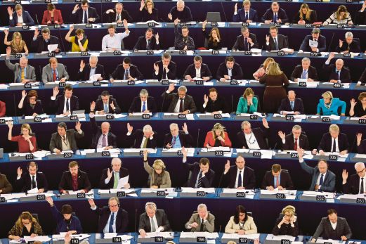  European Parliament members taking part in a vote to recognise the state of Palestine on Dec 12. AP pic 