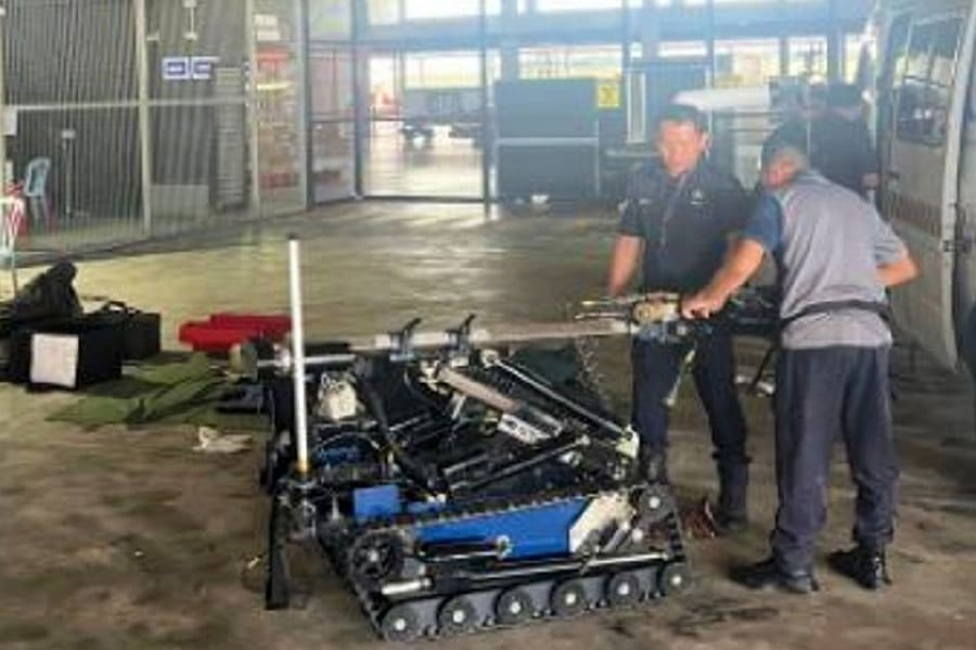 A package which arrived at the Kuala Lumpur International Airport (KLIA) Cargo Terminal with a note claiming it is a bomb caused panic today. PIC COURTESY OF POLICE