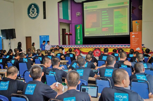 Inmates from the Henry Gurney Prison School participating in the Hour-of-Code programme. 