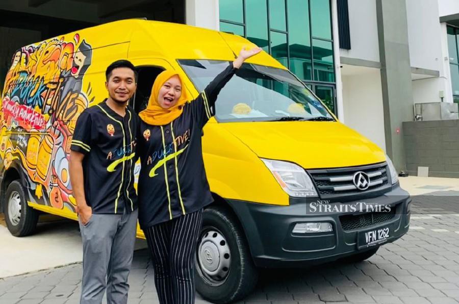 Aducktive Food   chief executive officer Mohamad Anif Azami with his wife and the company’s director, Nor Shahira Kamaruzaman.