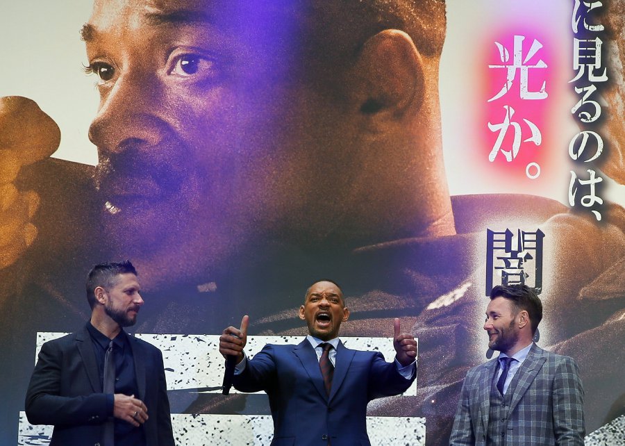  (L-R) US director David Ayer, US actor/cast member Will Smith and Australian actor/cast member Joel Edgerton attend the Japan premiere for the film 'Bright' in Tokyo, Japan, 19 December 2017. The American urban fantasy action crime film will be released globally on Netflix from 22 December. EPA-EFE 