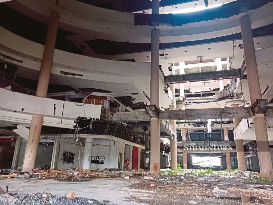 Lot 1 Waterfront City Mall appears dilapidated and vandalised. PIC BY JASSMINE SHADIQE
