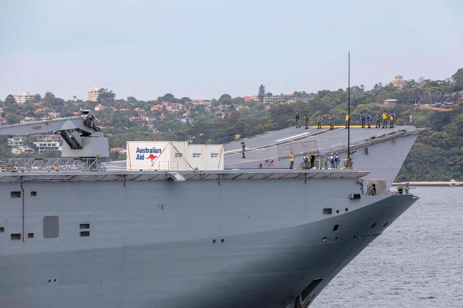 A coronavirus-hit Australian warship docked in Tonga on Wednesday, delivering desperately needed aid to the volcano-and-tsunami-struck nation under strict "no-contact" protocols. -AFP file pic